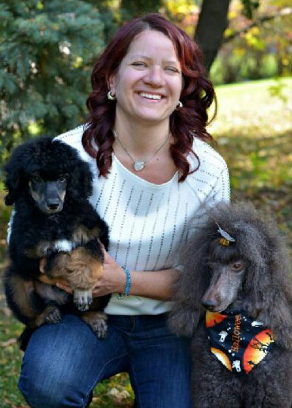 Lori with her Poodles